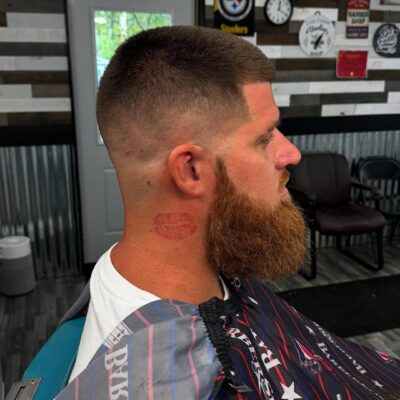 High bald fade haircut at Cole Cutsss Barbershop Potterville MI